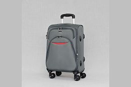 Малък текстилен куфар с четири колела в сиво