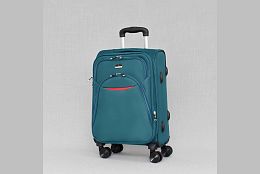 Малък текстилен куфар с четири колела в зелено