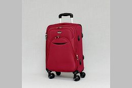 Малък текстилен куфар с четири колела в бордо