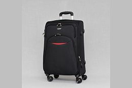 Среден текстилен куфар с четири колела в черно