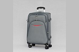 Среден текстилен куфар с четири колела в сиво