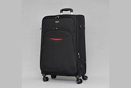 Голям текстилен куфар с четири колела в черно