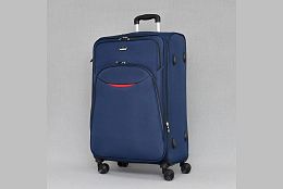 Голям текститен куфар с черити колела в тъмно синьо