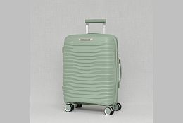 Малък куфар в зелено 