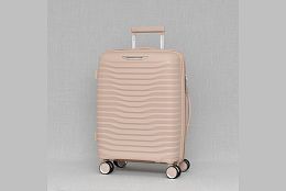 Малък куфар в бежово