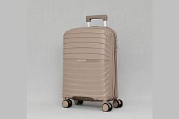 Малък релефен куфар в бежово