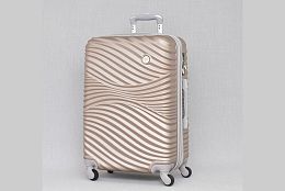 Среден релефен ABS куфар в бежово