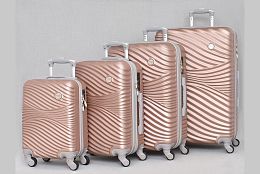 Комплект релефни ABS куфари в розово