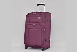 Среден текстилен куфар в лилав цвят