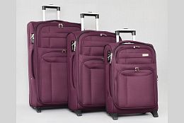 Комплект текстилни куфари в лилаво